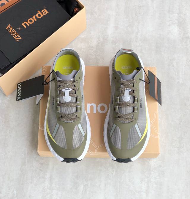 Zzegna杰尼亚联名款xnorda 运动跑鞋 官网同步发售 轻便透气跑步鞋 这款运动跑鞋上脚透气性超好，满蕴动感活力的运动跑鞋为您提供稳固支撑，秀出个性风采。