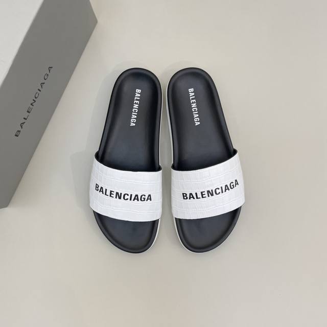 售 价 ￥ 商品商标 Balenciag* 巴黎世* 拖鞋 正码码数 38-44 可订做45 商品材料 鞋面进口牛皮，5D彩印工艺，羊皮内里，原版大底。 编 号
